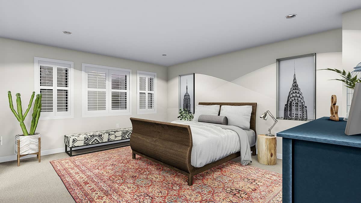主卧室有一个舒适的木床,图案的长椅上,红色的地毯,把地毯的地板上。